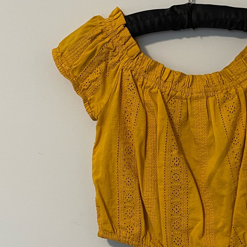 Cropped yellow off shoulder top.